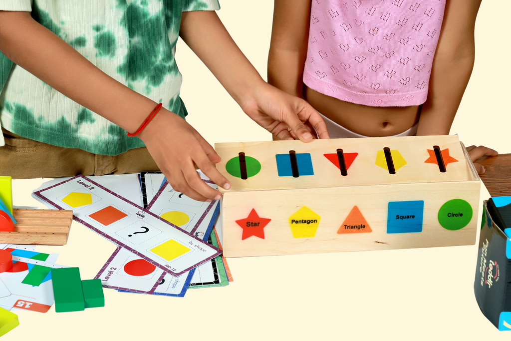 Shape Studio toddlr - child sorting wooden shapes into sorting tray