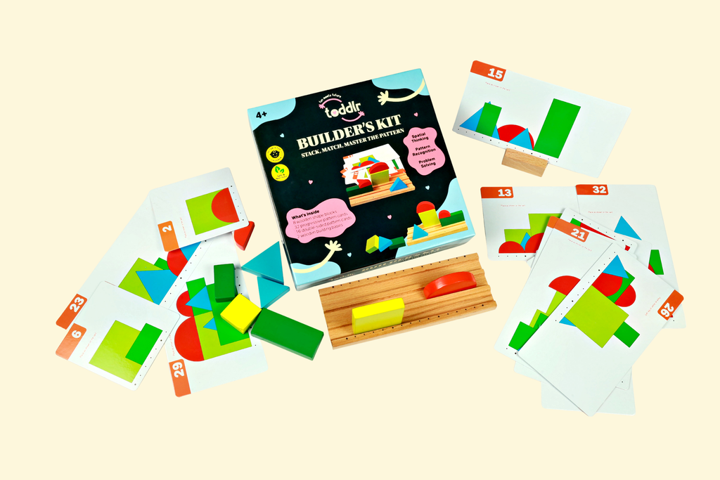Builder's Kit toddlr - toddler focused on spatial thinking block building activity