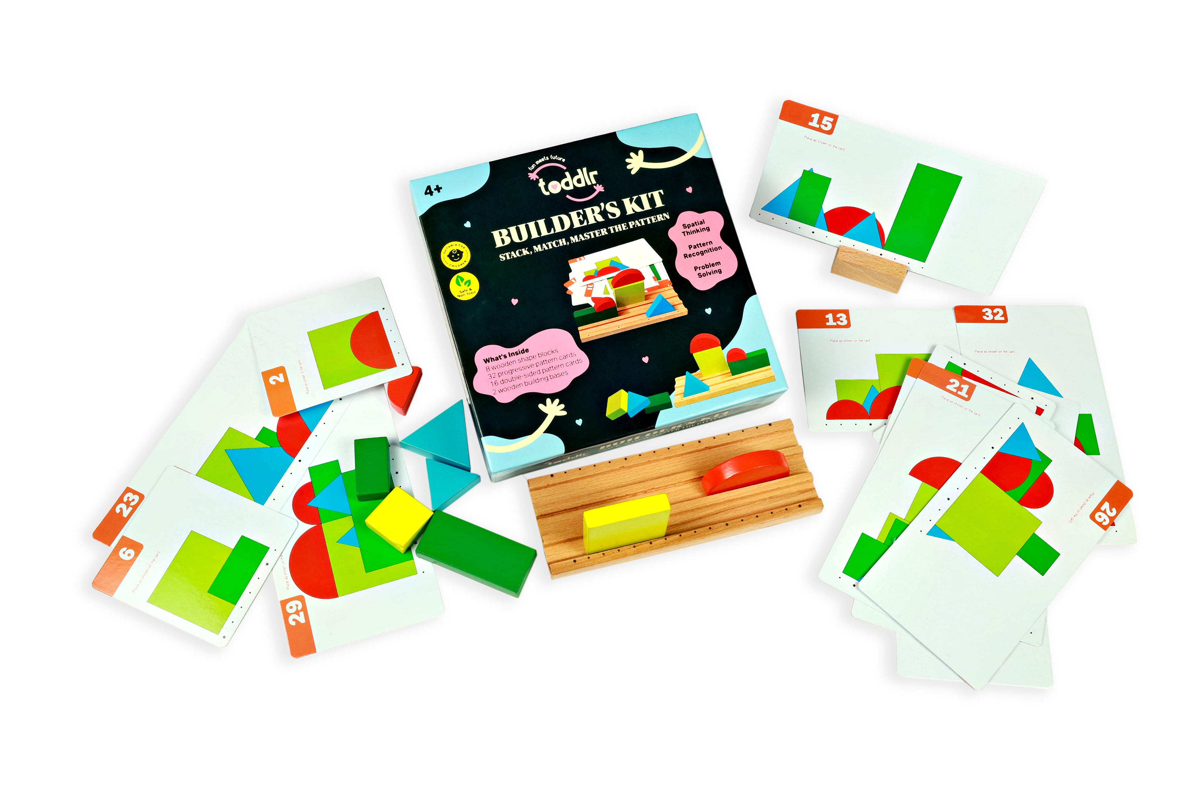 toddlr's building kit with colorful cards and wooden blocks on a white background