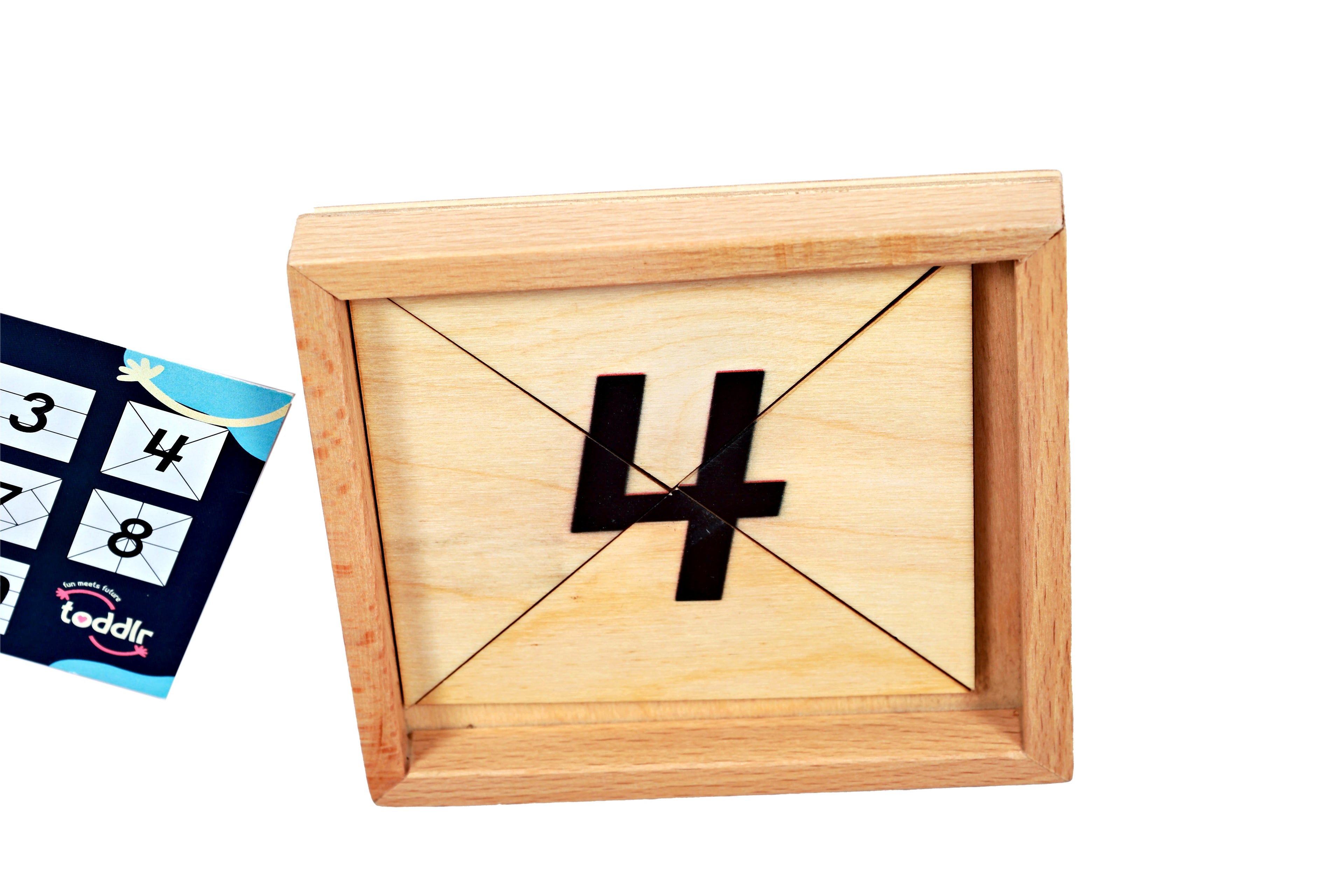 Wooden puzzle with number '4' and a card with numbers on a white background